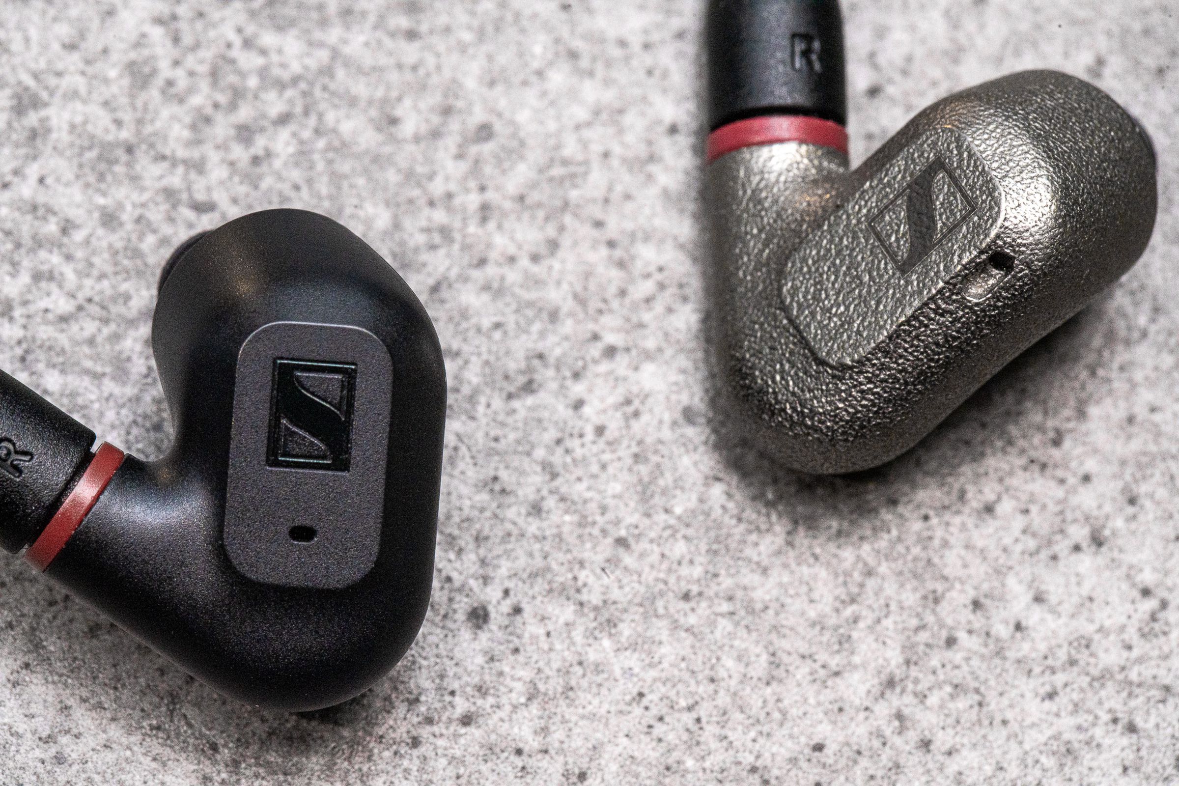 A photo comparing the housing material of Sennheiser's IE 200 and IE 600 earbuds.
